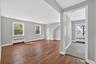 Unit #2-Spacious living area with view into the kitchen.