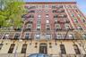 Brick facade building featuring decorative window lintels and sills