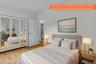 Light wood-finish flooring complements white walls