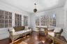 Private sleeping porch/sunroom off primary suite