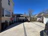 Expansive concrete patio with an integrated paver strip