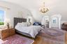 Second floor PrimaryCathedral, hardwood, custom windows,