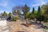 Private Backyard fully fenced, private landscaping, specimen trees