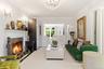 elegant crown moldings, hardwood floors, chandeliers