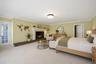 Primary Bedroom with fireplace.