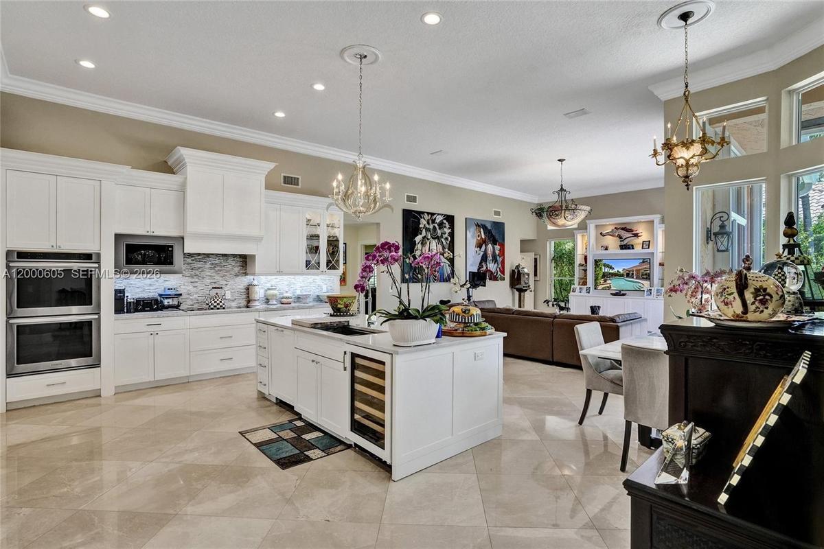 DOUBLE OVEN, BRAND NEW MICROWAVE, WINE COOLER IN WHITE MODERN OPEN KITCHEN