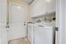 LARGE LAUNDRY ROOM WITH CABINETS!