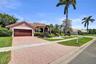 GORGEOUS CORNER LOT! 2 CAR GARAGE WITH MAGNIFICENT LANDSCAPING!