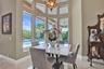 ENJOY YOUR MEAL OVERLOOKING THE POOL AND LANDSCAPING