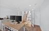 Home office featuring French doors, recessed lighting, crown molding, and wood-finish flooring