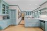 Chef's kitchen with wonderful light and ample storage