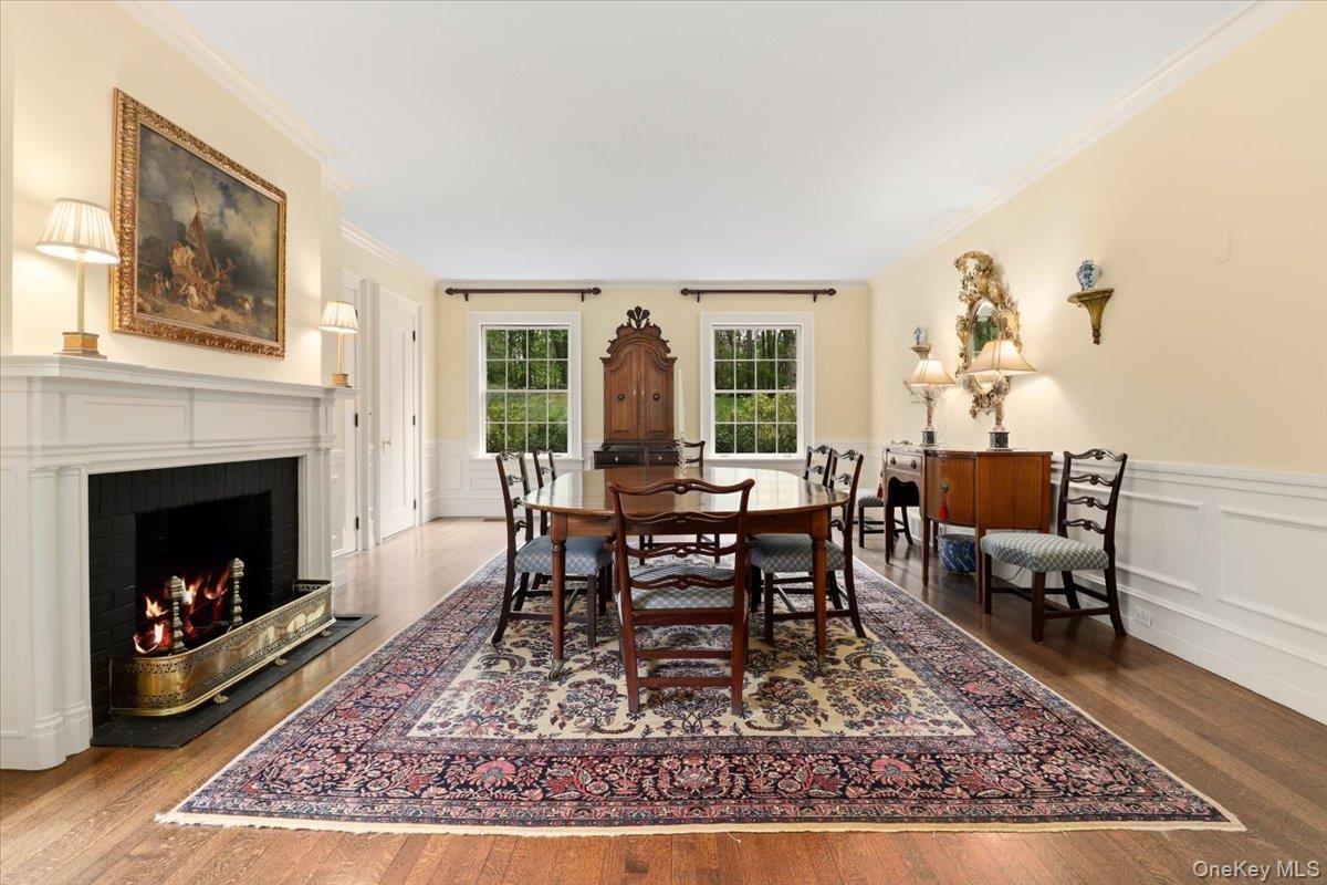 Gracious dining room with fireplace