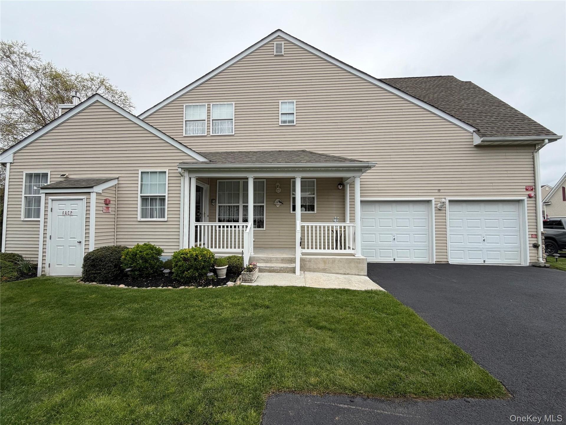 Welcome to 19 Meadow Pond Ct., a covered front porch, 2 car garage, 3 extra spaces to park, plus 3 guest spaces on the street!