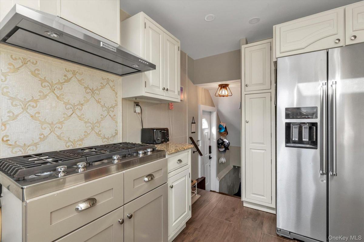 Fully Renovated Kitchen With SS Appliances, Skylight, Radiant Flooring
