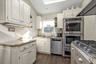 Fully Renovated Kitchen With SS Appliances, Skylight, Radiant Flooring