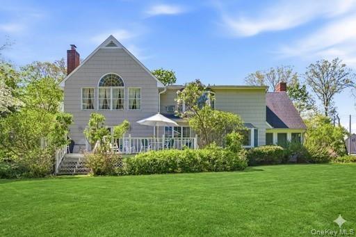 Rear view of expanded home