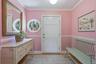 Guest enter a comfortabe entry foyer