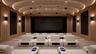 Private cinema designed for an elevated viewing experience, featuring tiered climate-controlled seating, surround sound, and refined architectural det