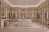 Custom-designed walk-in closet featuring boutique-style illuminated cabinetry, glass-front storage, a center island, and a dedicated vanity for a refi