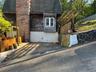 Entrance To house and parking.