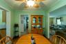 Dining area featuring wood-finish flooring and a ceiling fan with integrated lighting