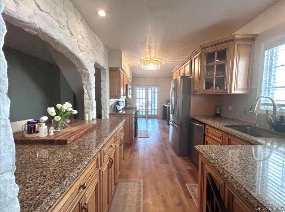 Kitchen with granite countertops with natural Gas for cooking