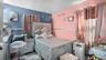 Bedroom with a textured ceiling