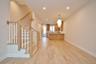Another view of the living room, dining area & kitchen