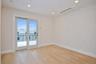Recreation room with slider door out to deck.
