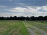 View of road with a view of countryside and a wooded view