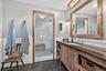 Lower primary bat with steam shower