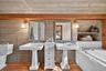Upper primary bath, double sinks, tub with a view, shower