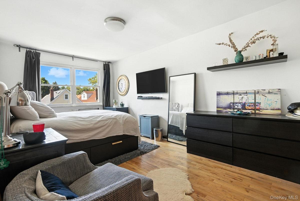 Bedroom featuring wood finished floors