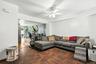 Living area featuring a ceiling fan