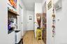 Corridor featuring light wood finished floors