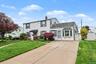 Side of Home, Large Driveway.