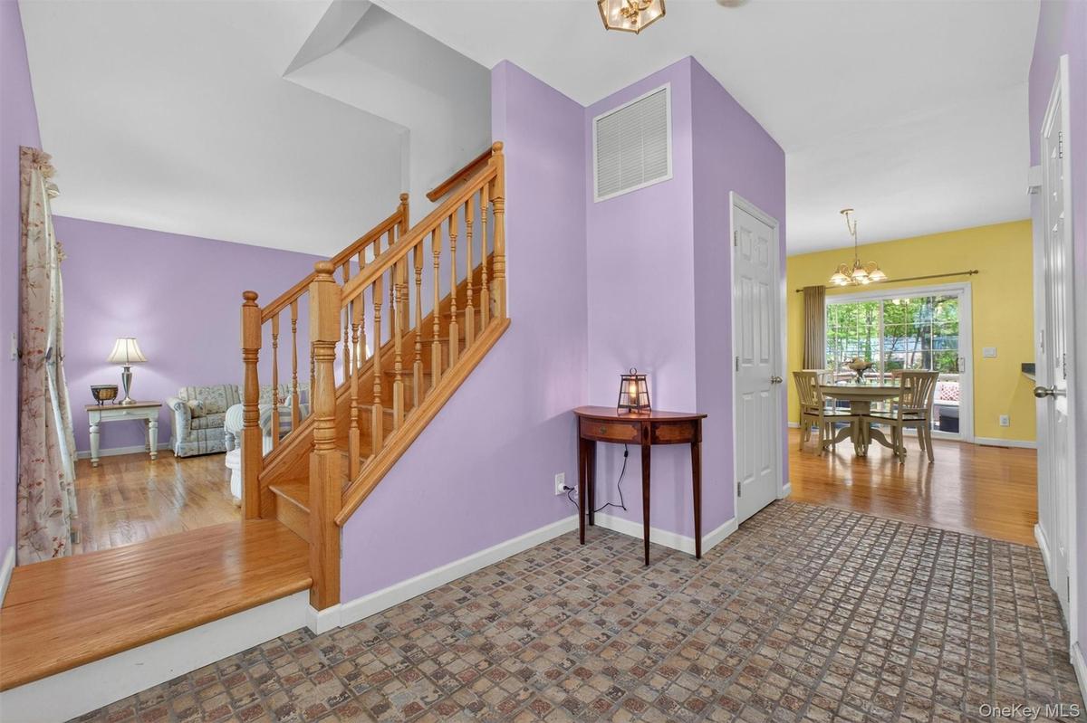 Home Sweet Home!  Spacious entry foyer leads to living room, kitchen and formal dining room.