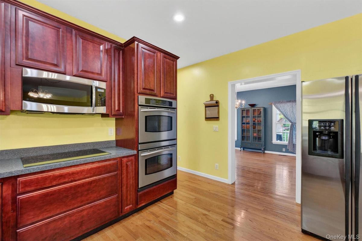 Cooktop, microwave, and double wall oven.  Microwave features an Advantium speed cook convection oven.