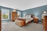 Spacious primary bedroom.  Large enough for a king size bed and sitting area.
