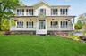 The full length front porch is the perfect spot to relax and unwind after a long day.