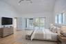 Master Bedroom with sliding doors to private deck