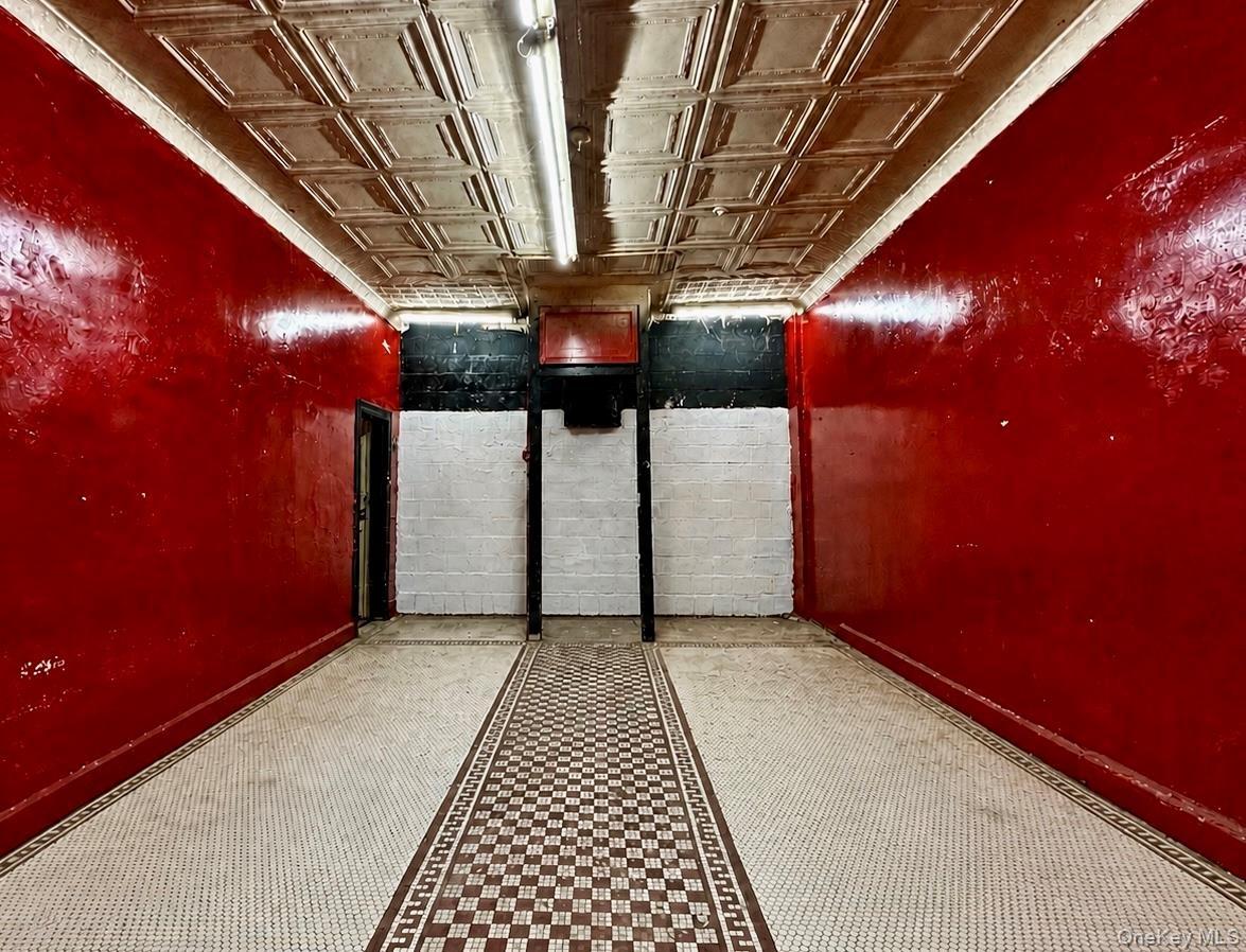 1st floor - Endless potential awaits in this oversized space — ideal for creating a storefront, expanding the first-floor apartment, or designing a un