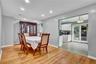 Wood-finish flooring throughout, complemented by recessed lighting