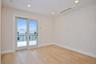 Recreation room with slider door out to deck.