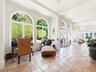 Expansive Sunroom Overlooking the Lush Yard