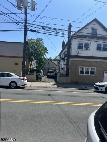 Left side w/ 2 car garage
