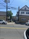 Left side w/ 2 car garage