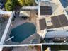 OUTDOOR BAR, IN-GROUND SWIMMING POOL. SOLAR PANELS