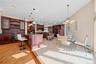 gourmet kitchen w/bar next to family room