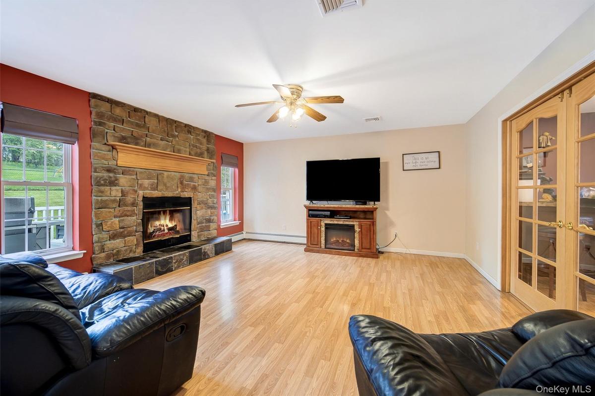 Ceiling fan and French doors to front recreation room